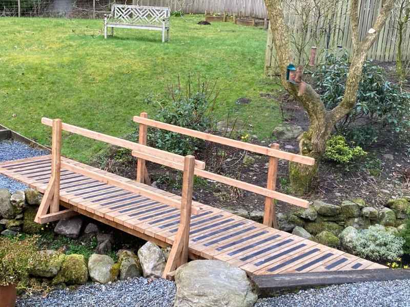 Anti Slip Decking Strips on Garden Bridge Feeding Squirrel