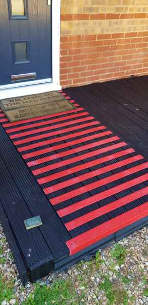 Red Non Slip Strips used on black decking