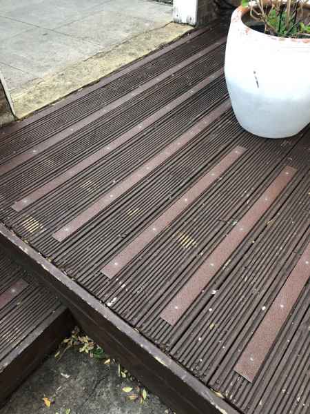 Brown decking strips on garden decking