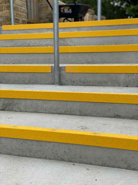 Anti slip yellow nosing on concrete stair