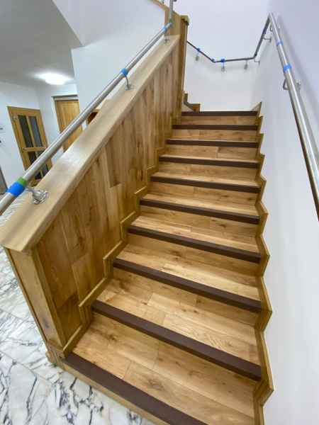 Brown stair nosing internal wooden office staircase