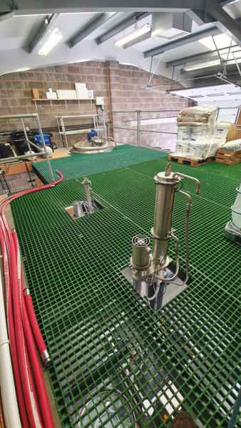 Green GRP grating in Exmoor Distiller mezzanine tank