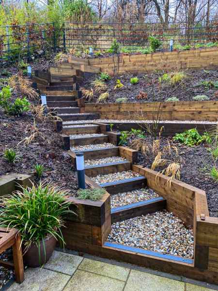 50mm anti slip decking strips in grey on garden wooden sleeper steps