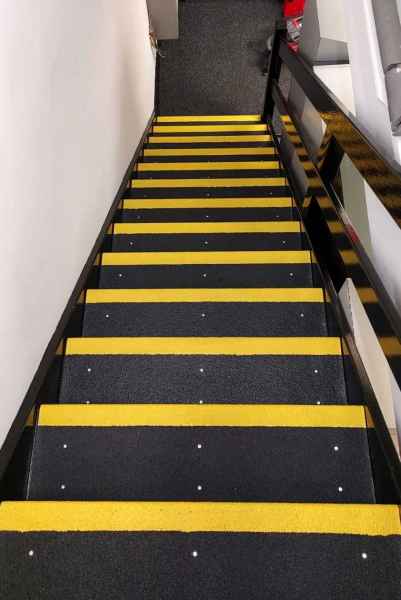 Black yellow stair tread on internal staircase