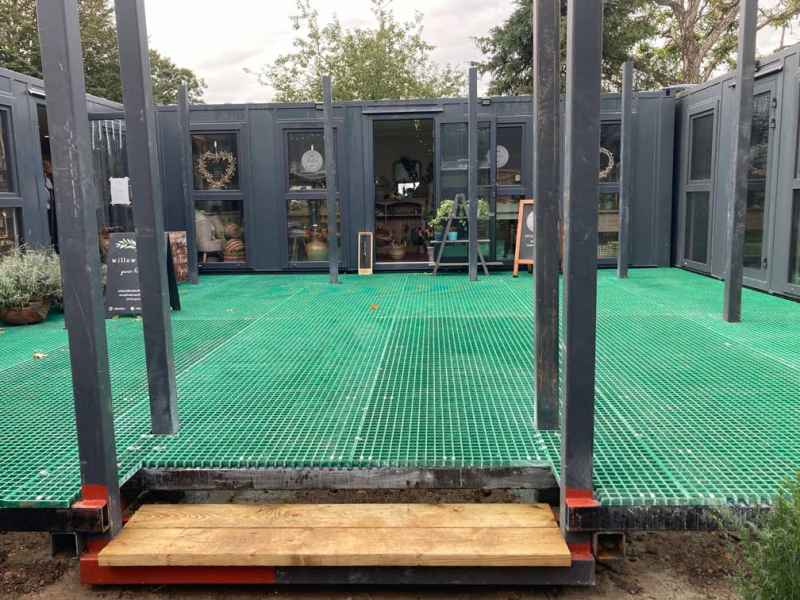 Green 25mm grating used as outdoor coffee shop