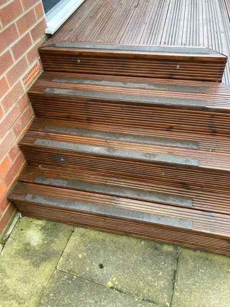 Black 50mm decking strips on slippery decking steps