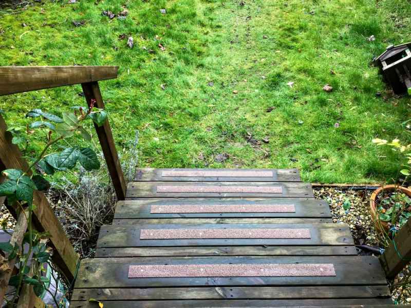 50mm Brown Decking strips on wooden garden stairs steps algae moss