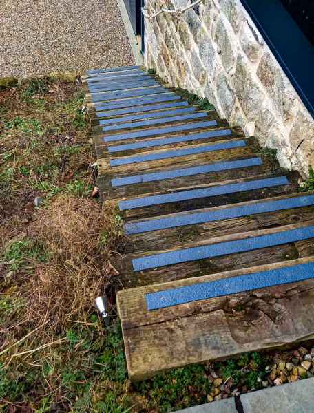 50mm Dark Grey decking strips on timber sleeper wooden steps