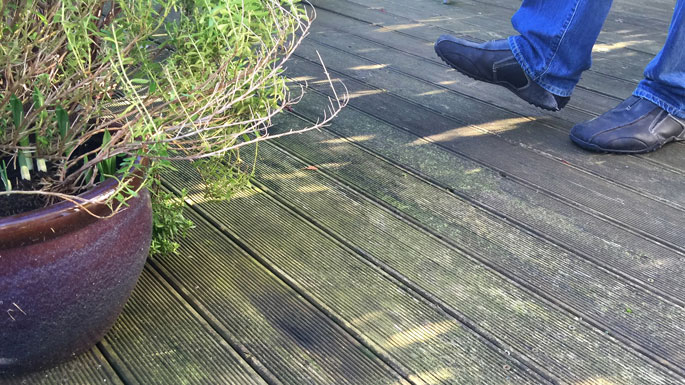 slippery decking with moss