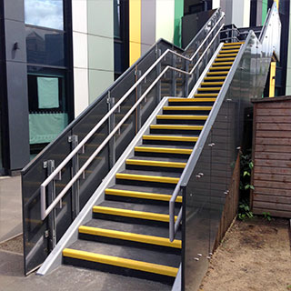 Anti-slip treads applied to stairs and landing areas.