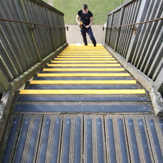 DDA compliant yellow nosings highlight the step edges.