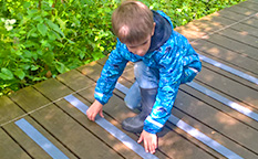 Non-slip decking strips for wooden footbridges at Harrington Reservoir Local Nature Reserve.