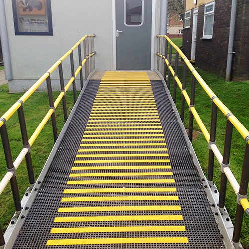 Classroom access ramp with decking strips to create a safer environment.