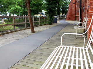Gritted flat sheets create safe pathways.