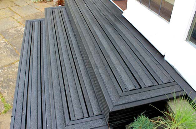 Fibreglass anti slip decking strips make slippery wooden steps safe.