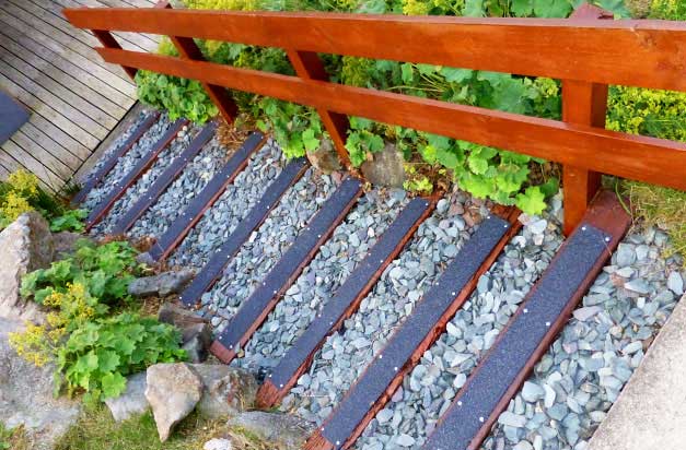 Anti-slip decking strips garden steps feature.