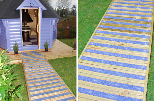 Colourdec bayside non-slip decking strips on garden summerhouse pathway.