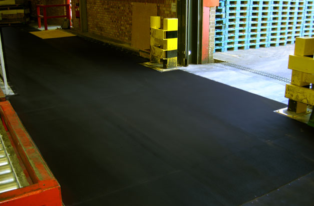 Anti-slip floor sheets commercial loading bay area installation.