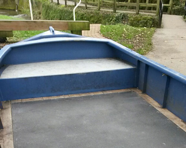 Slippery boat deck installation with non slip floor sheets.