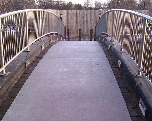 Anti-slip sheets create safer areas on a slippery timber bridge surface.