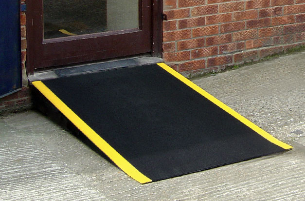 Floor sheets provide a non-slip area for a door threshold ramp.
