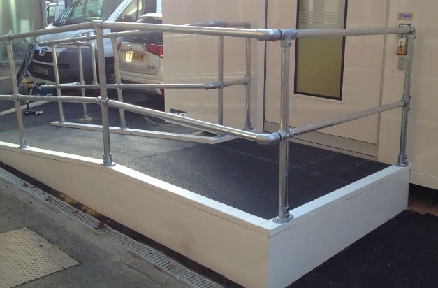Non slip floor sheets wheelchair access ramps installation by facilities management.