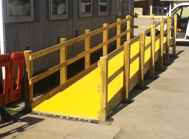 Non slip floor sheets improve safety on slippery wooden access ramps.