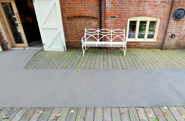 GRP floor sheets on slippery wooden decking areas at Snape Maltings.