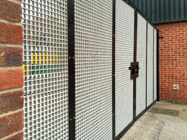 GRP Grating replaces metal steel grating for this secure gate installation.