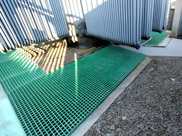 Generator transformer walkway area with open mesh industrial GRP Grating.