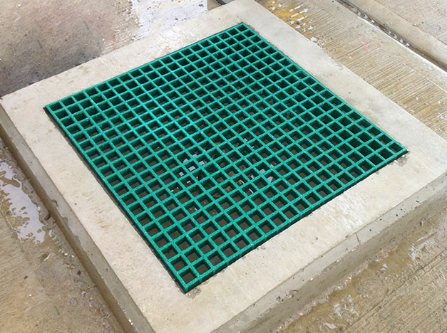 GRP Grating man hole or trench cover, a lightweight and hard wearing alternative to steel.