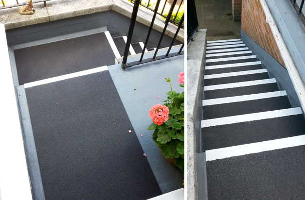 Stairs and entrance with anti-slip stair treads and extra wide treads for landing covers.