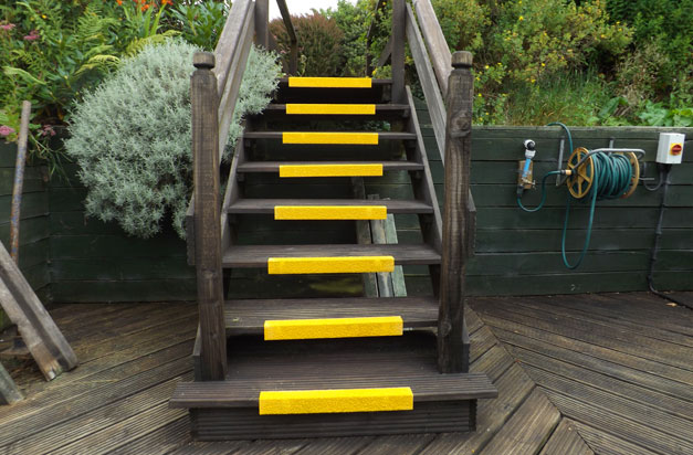 Anti slip stair nosings timber wooden stairway installation.