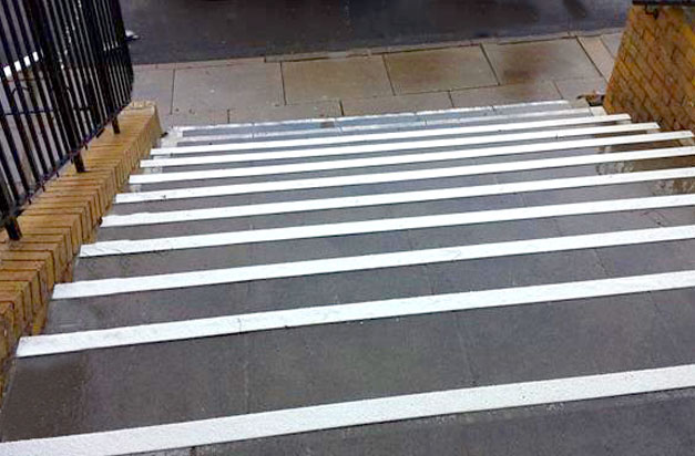 Anti slip stair nosings clad concrete steps installation.