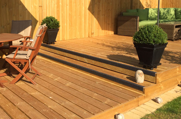 Stair nosings protect as well as highlight garden decking steps.
