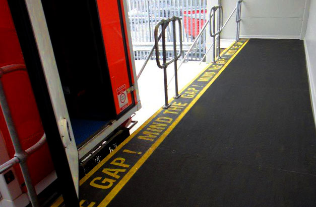 Anti-slip stair tread covers loading bay installation.