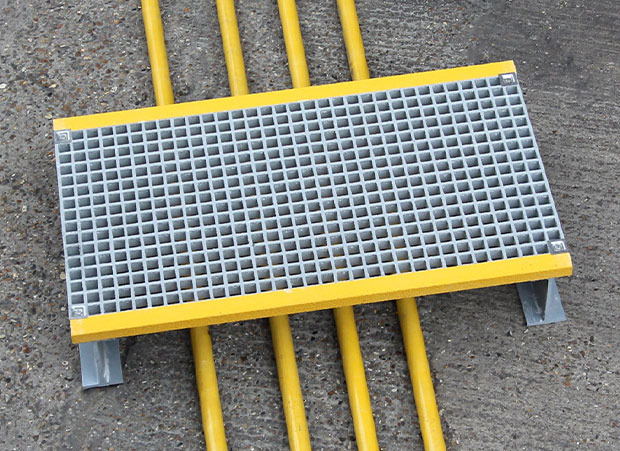 Custom made stepover platform for cables, pipes and troughs