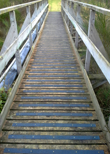 Non-slip decking strips country walkways.
