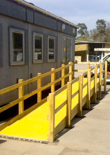 Access ramp with anti slip floor sheets.