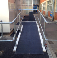 Non-slip floor sheets public access ramp.
