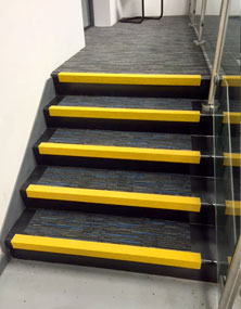 Anti slip nosings on internal office stairways.