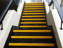 Stair tread covers public walkway installation.
