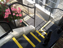 non slip stair covers landing covers leading to a basement flat.